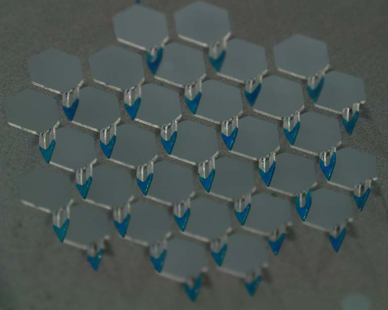 microneedles in a hexagonal grid