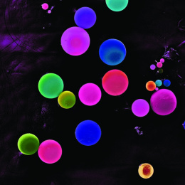 fluorescently colored spheres on a black background